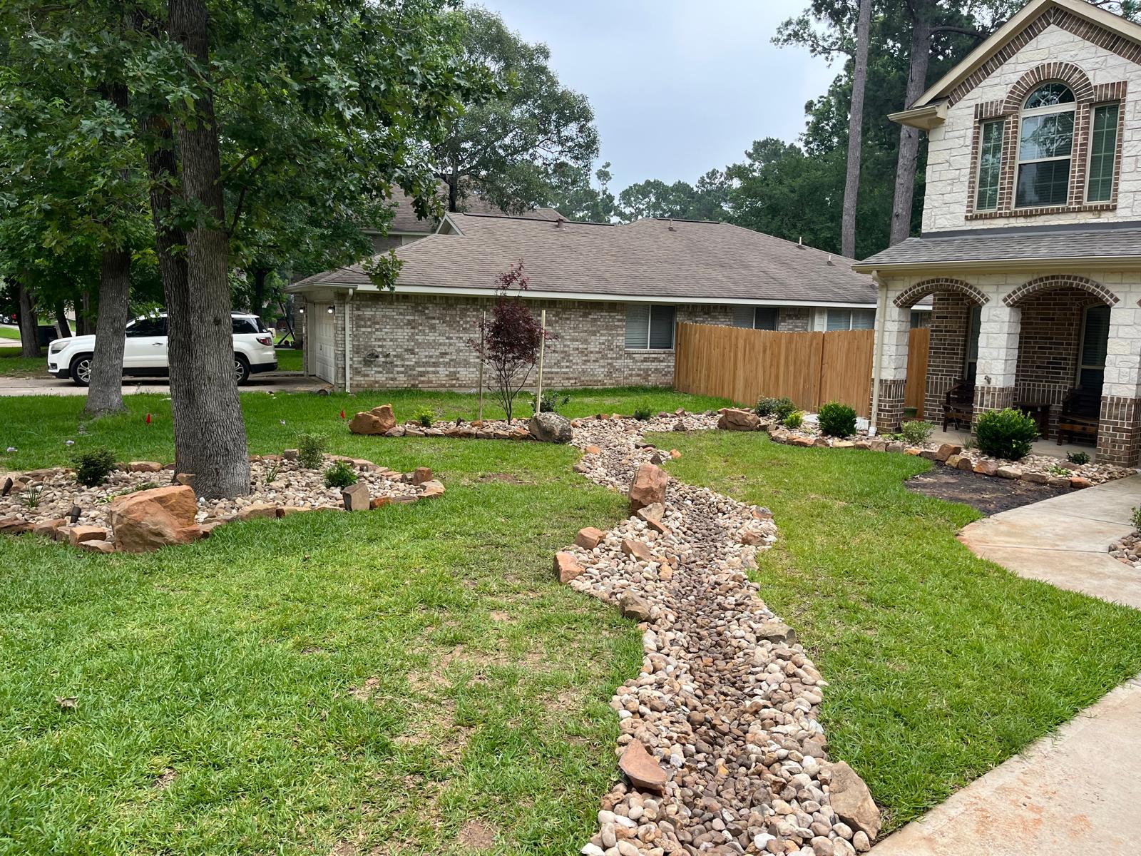 Drainage & Landscape: Decorative dry creek installation